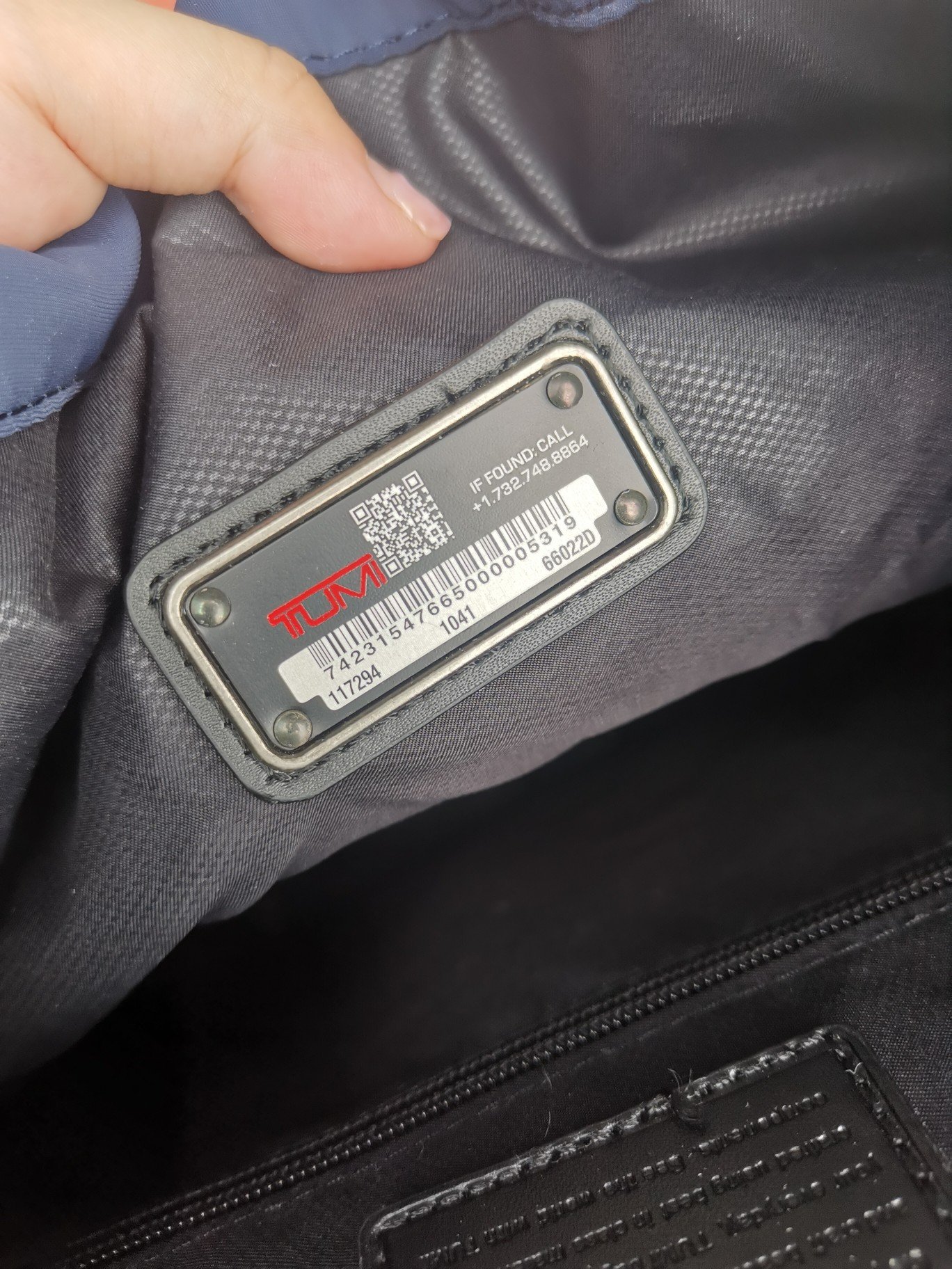TUMI