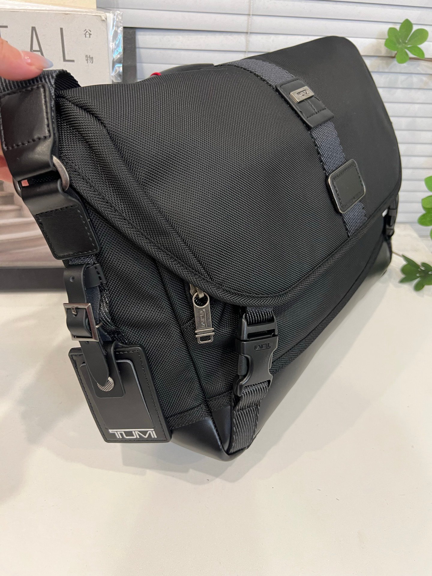 TUMI