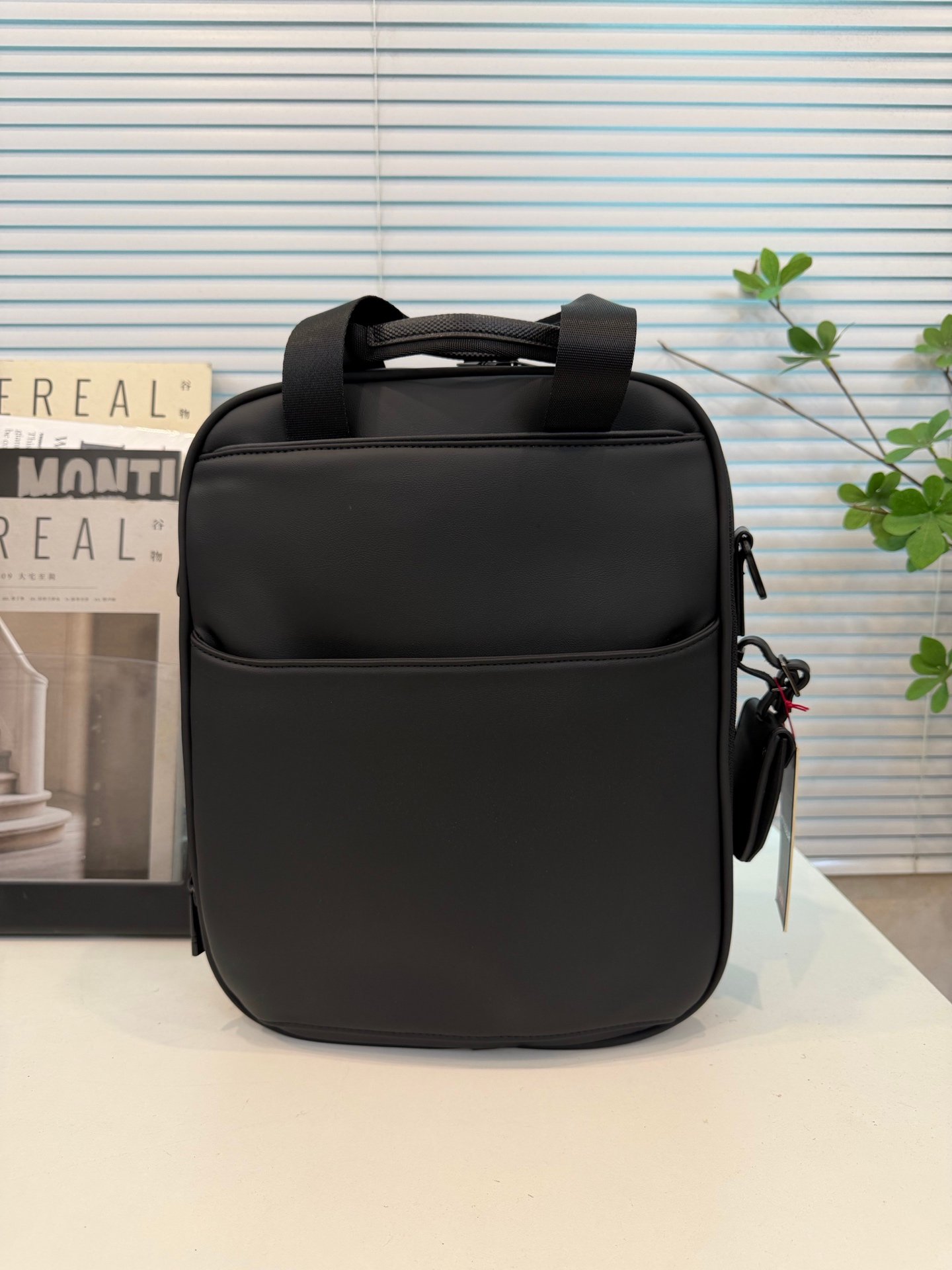 TUMI